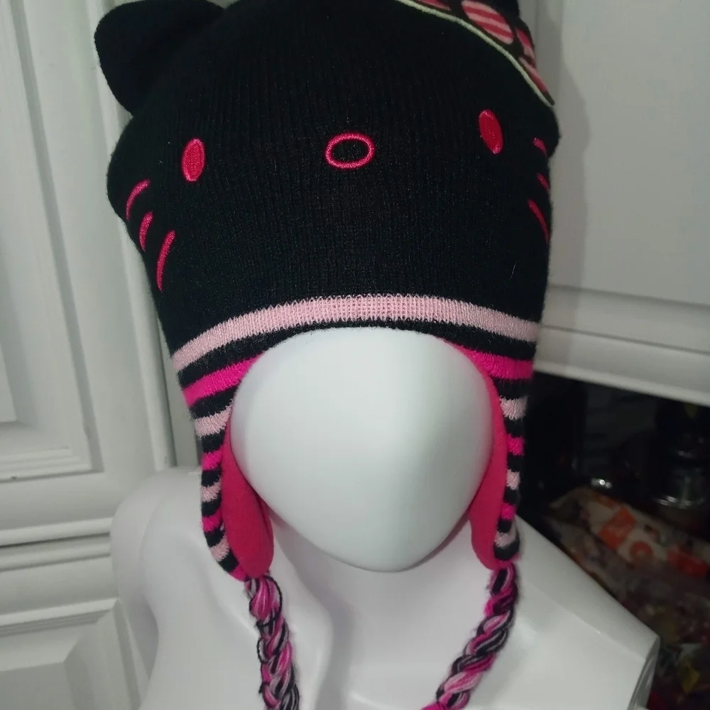 Hello Kitty girl knit beanie ear flap cap w Embroidered face and braided tassels